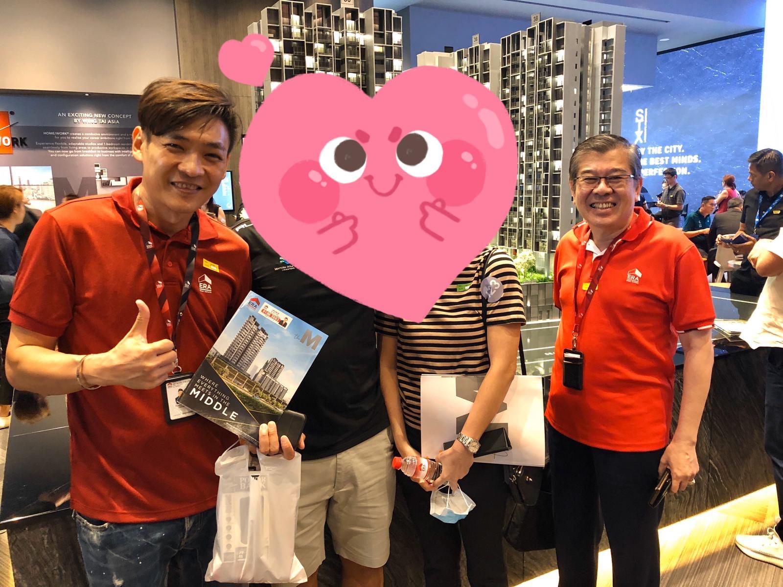 Kelly and Mark Yu with satisfied client
