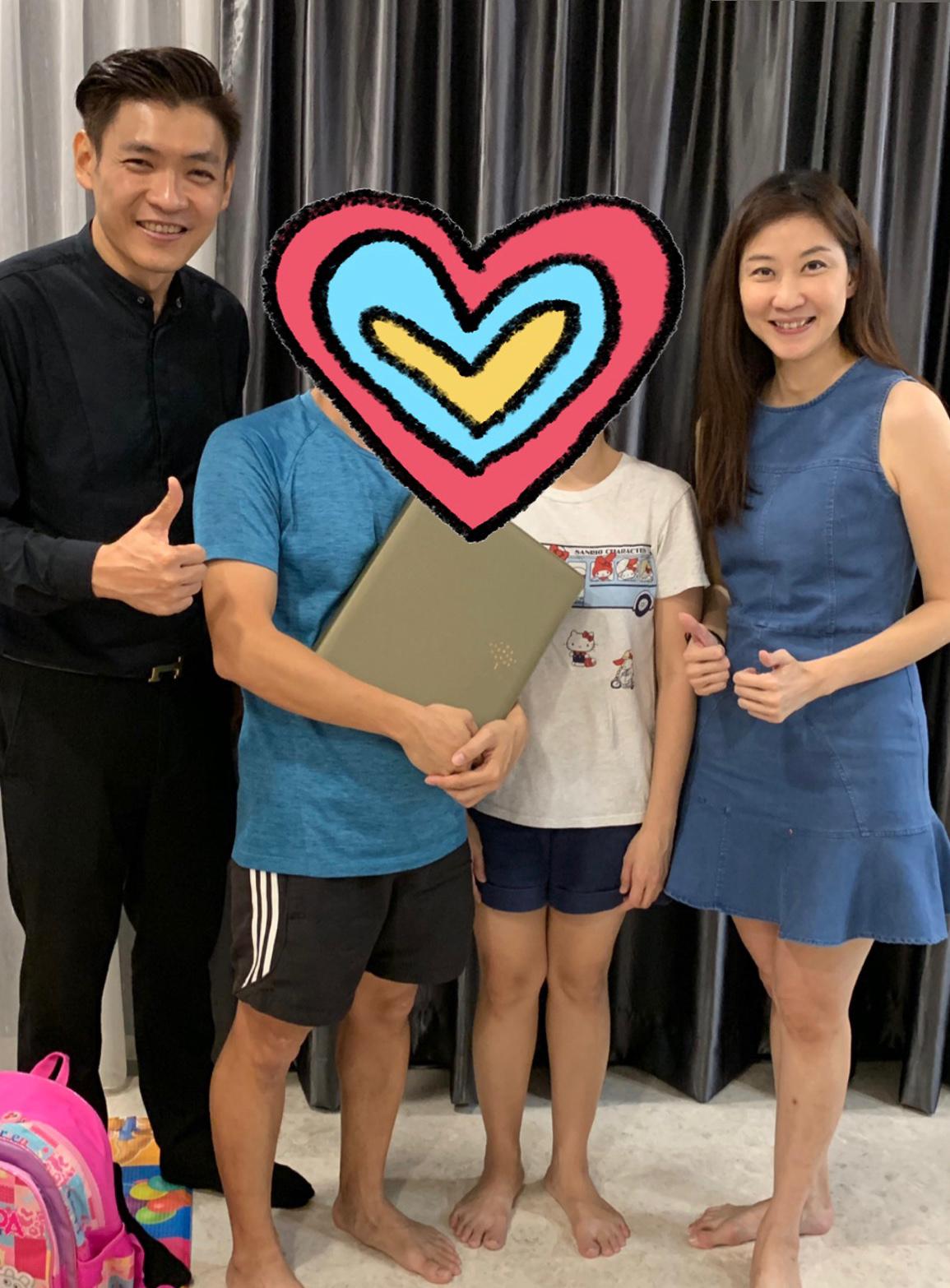Kelly and Mark Yu with satisfied client