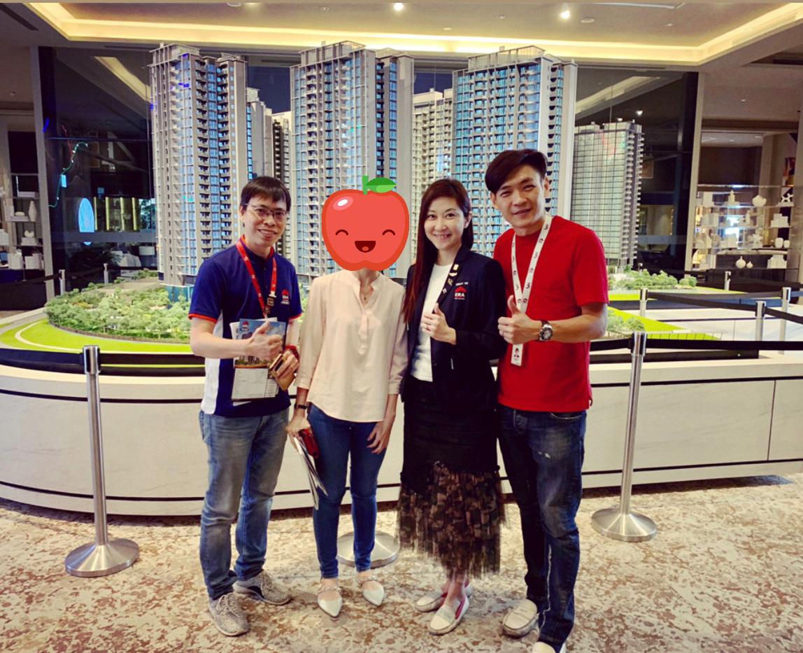 Kelly and Mark Yu with satisfied client