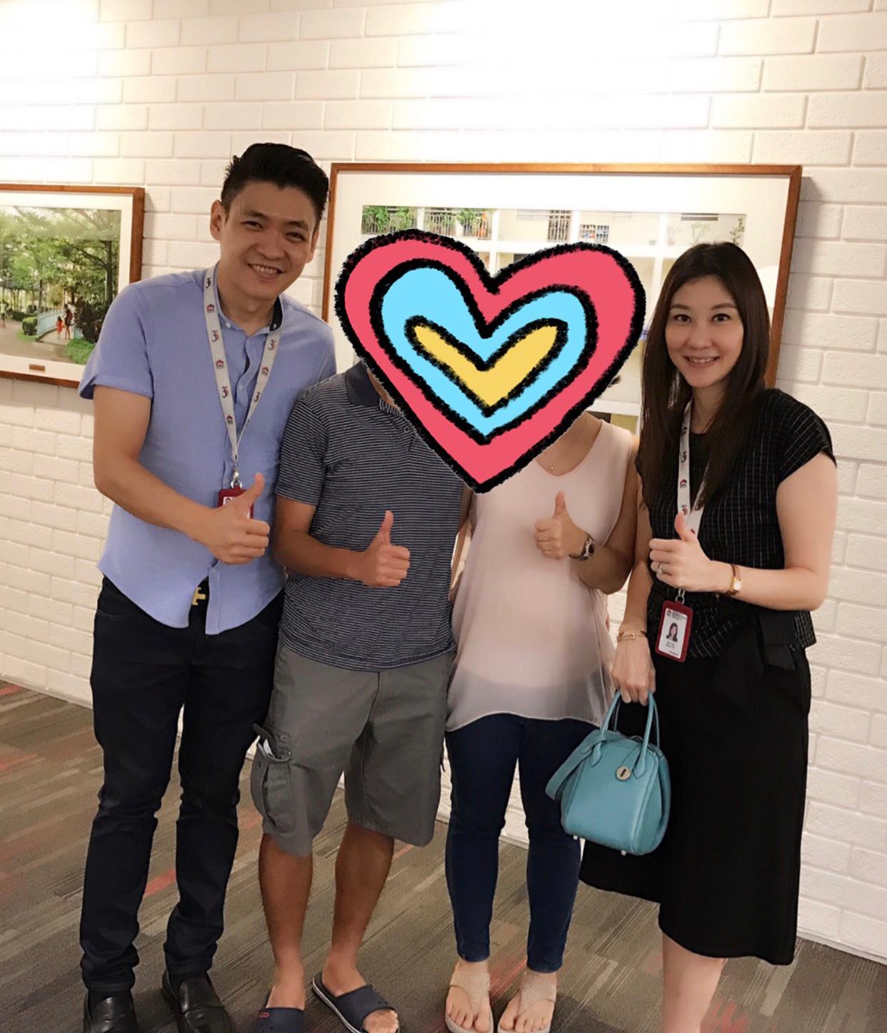 Kelly and Mark Yu with satisfied client