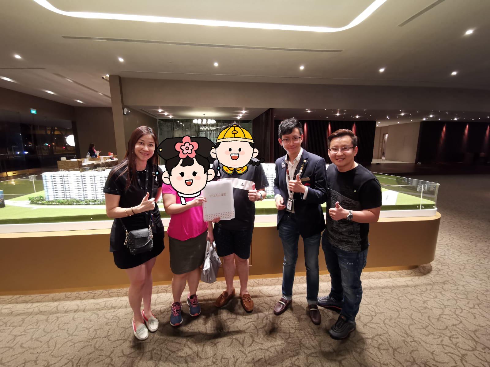 Kelly and Mark Yu with satisfied client