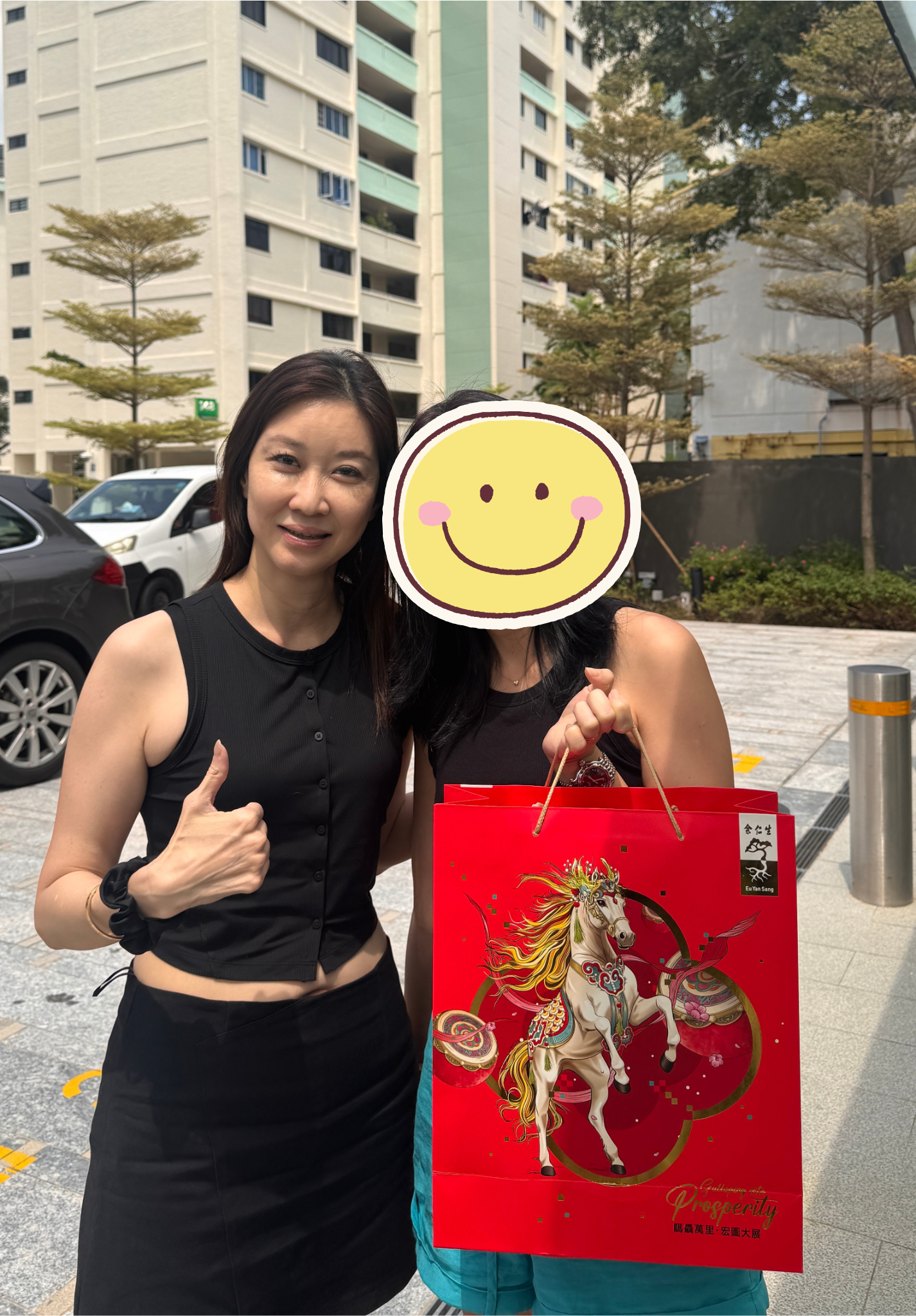 Kelly and Mark Yu with satisfied client