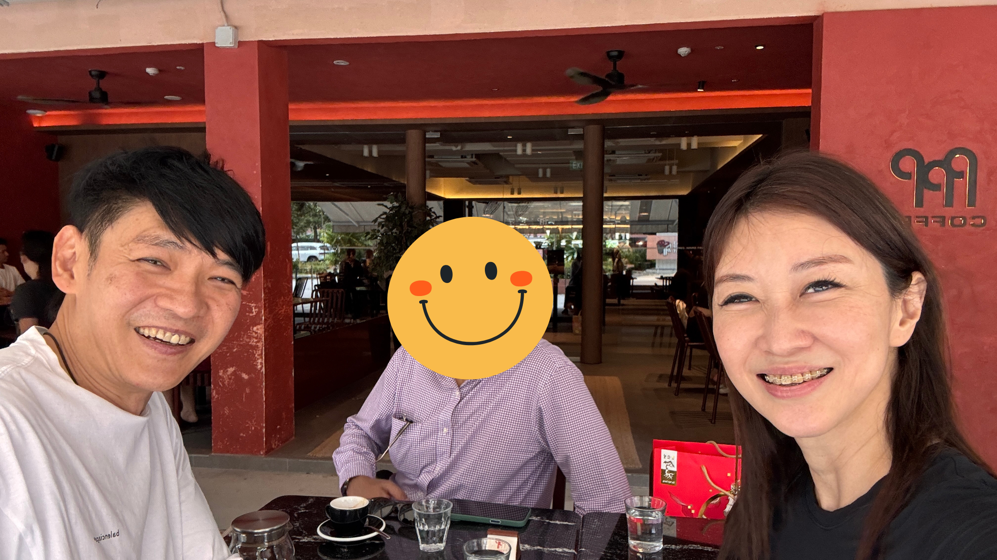 Kelly and Mark Yu with satisfied client