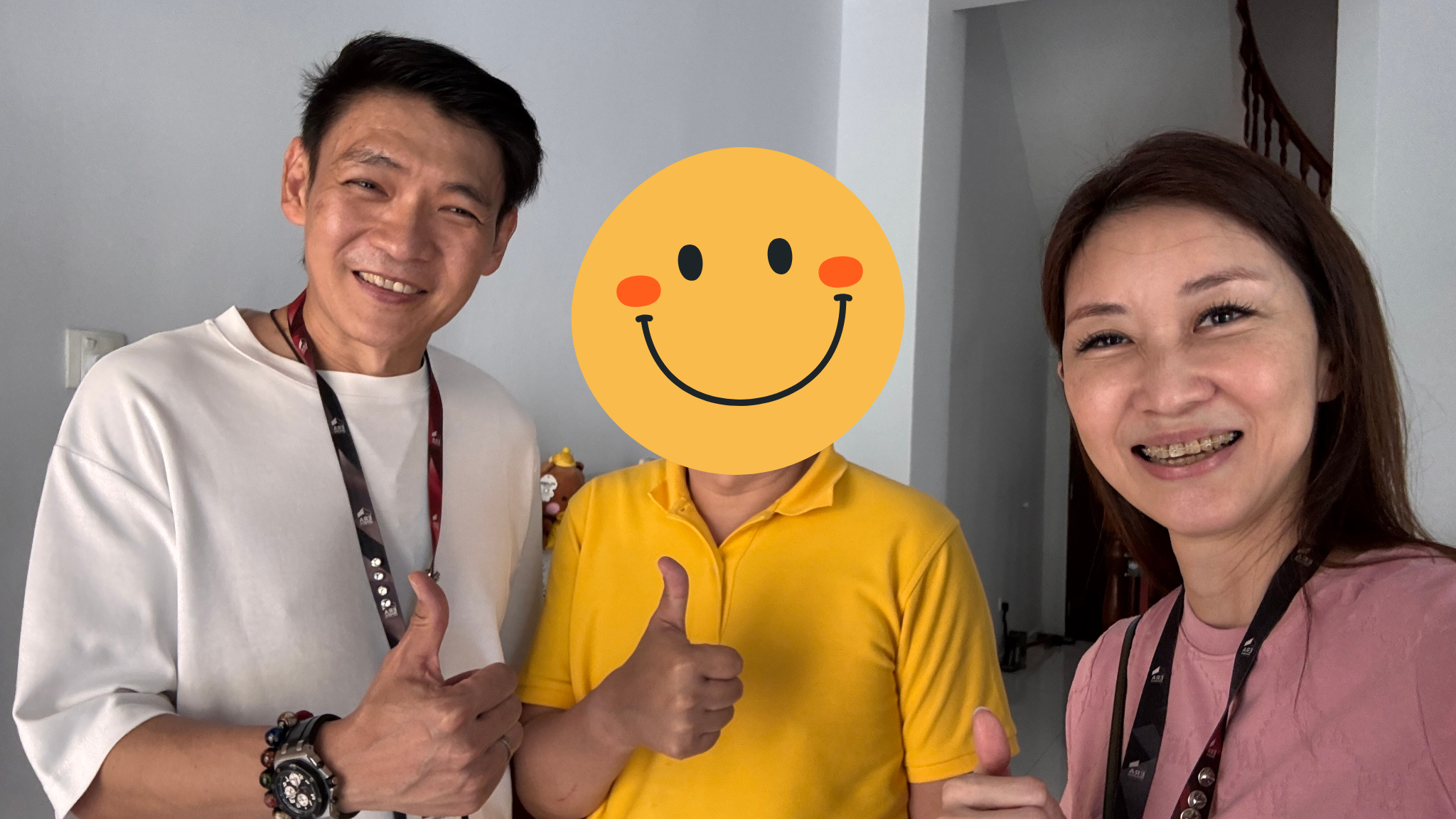 Kelly and Mark Yu with satisfied client